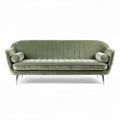 Velvet green sofa with padded arms and chrome legs for living room use